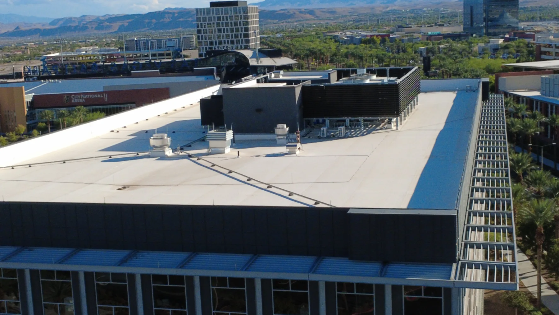 Flat white commercial roof with a rooftop equipment enclosure, Las Vegas