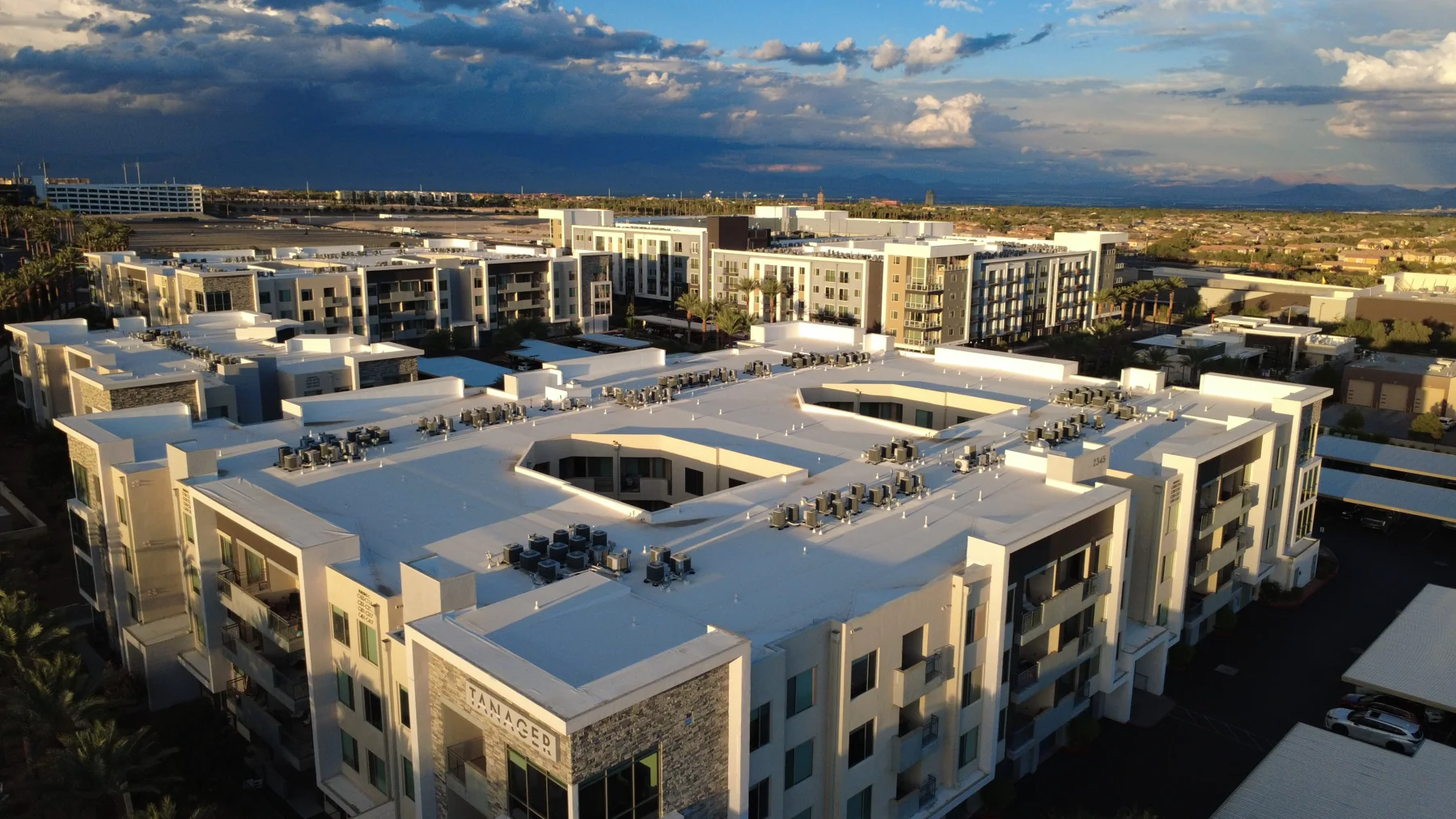 Aerial view of a multifamily complex's roofs and courtyards, Las Vegas